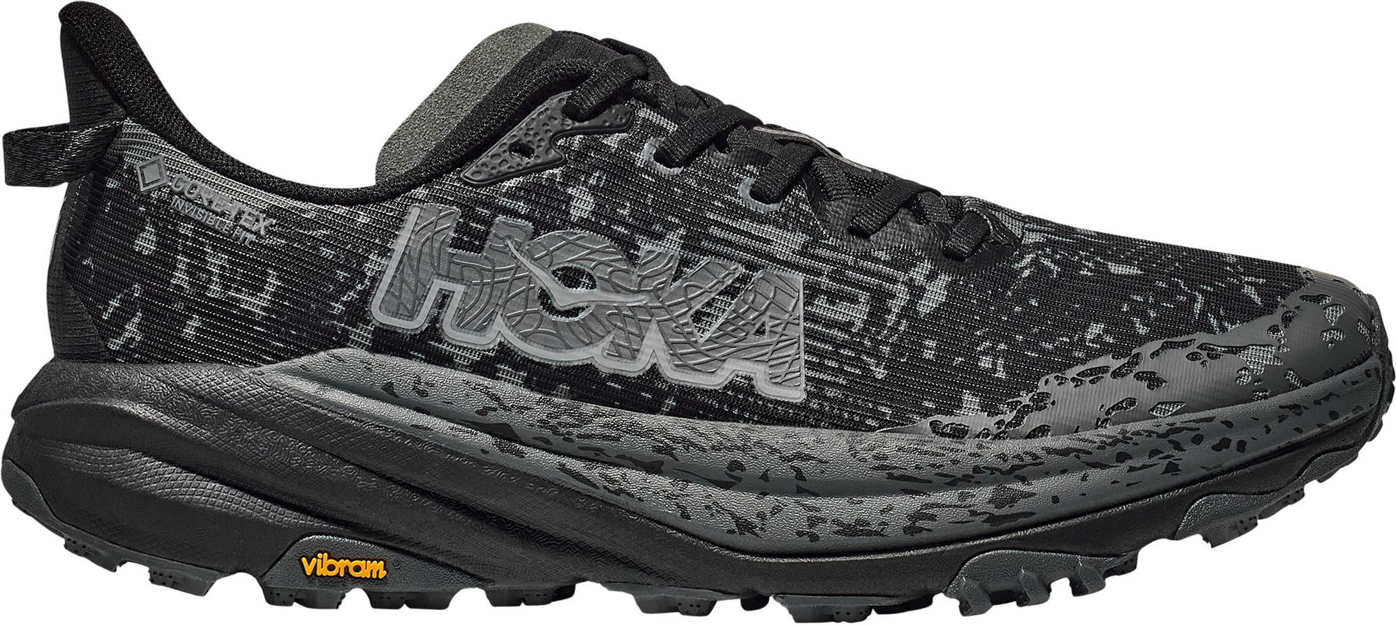 Black and gray HOKA Men's Speedgoat 6 GORE-TEX Trail Shoes with a textured upper, prominent logo, and Vibram outsole, size 11.
