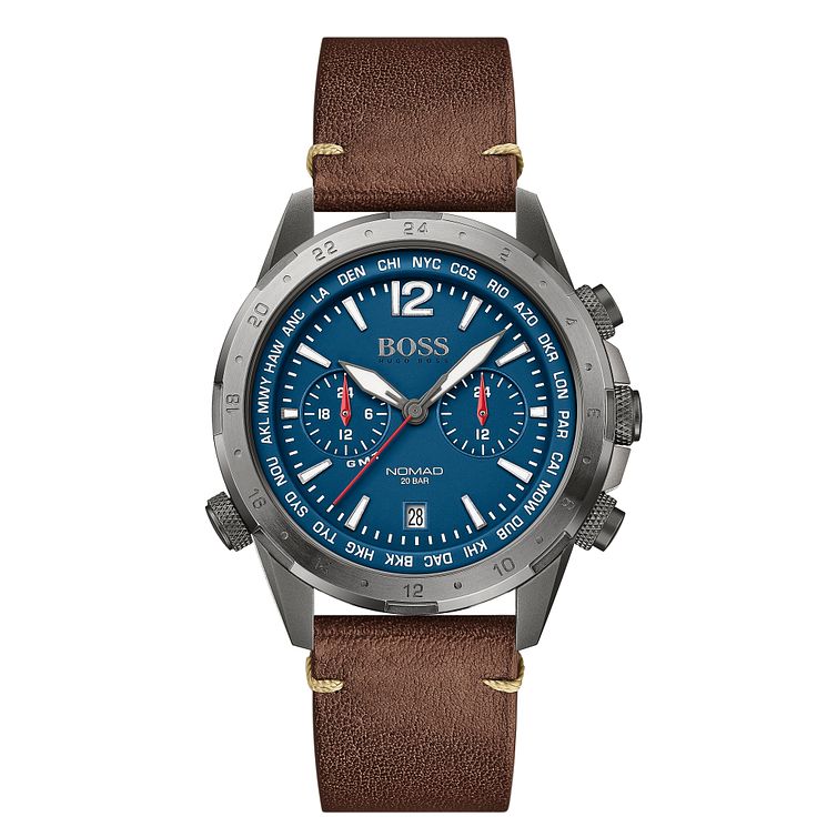 Men's Hugo Boss Nomad GMT chronograph watch features a 44mm blue dial, two red sub-dials, a brown leather strap, and a stainless steel case with a date display at 6 o'clock.