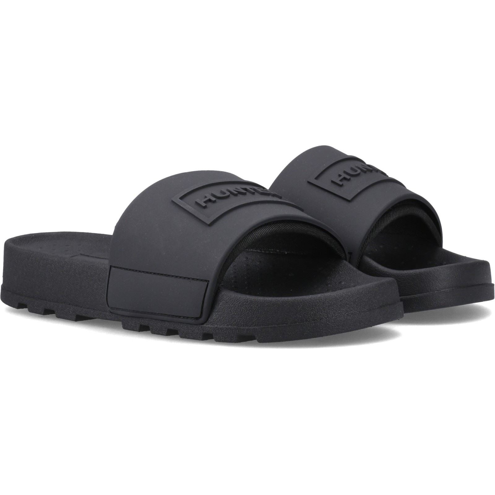 Black polyester slides featuring an embossed "Hunter" logo on the strap, with a textured footbed and durable rubber sole for comfort and style.