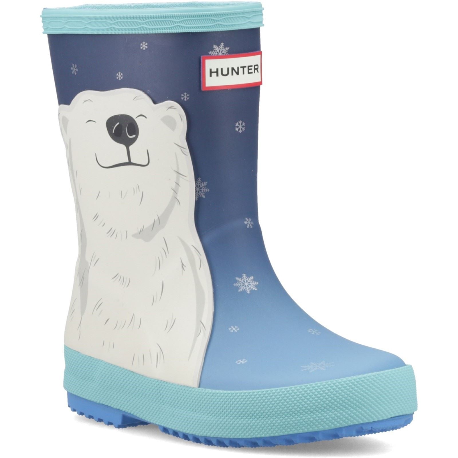 Blue rubber Wellington boot featuring a polar bear design, with a light blue sole and snowflake accents, ideal for kids and insulated for warmth.