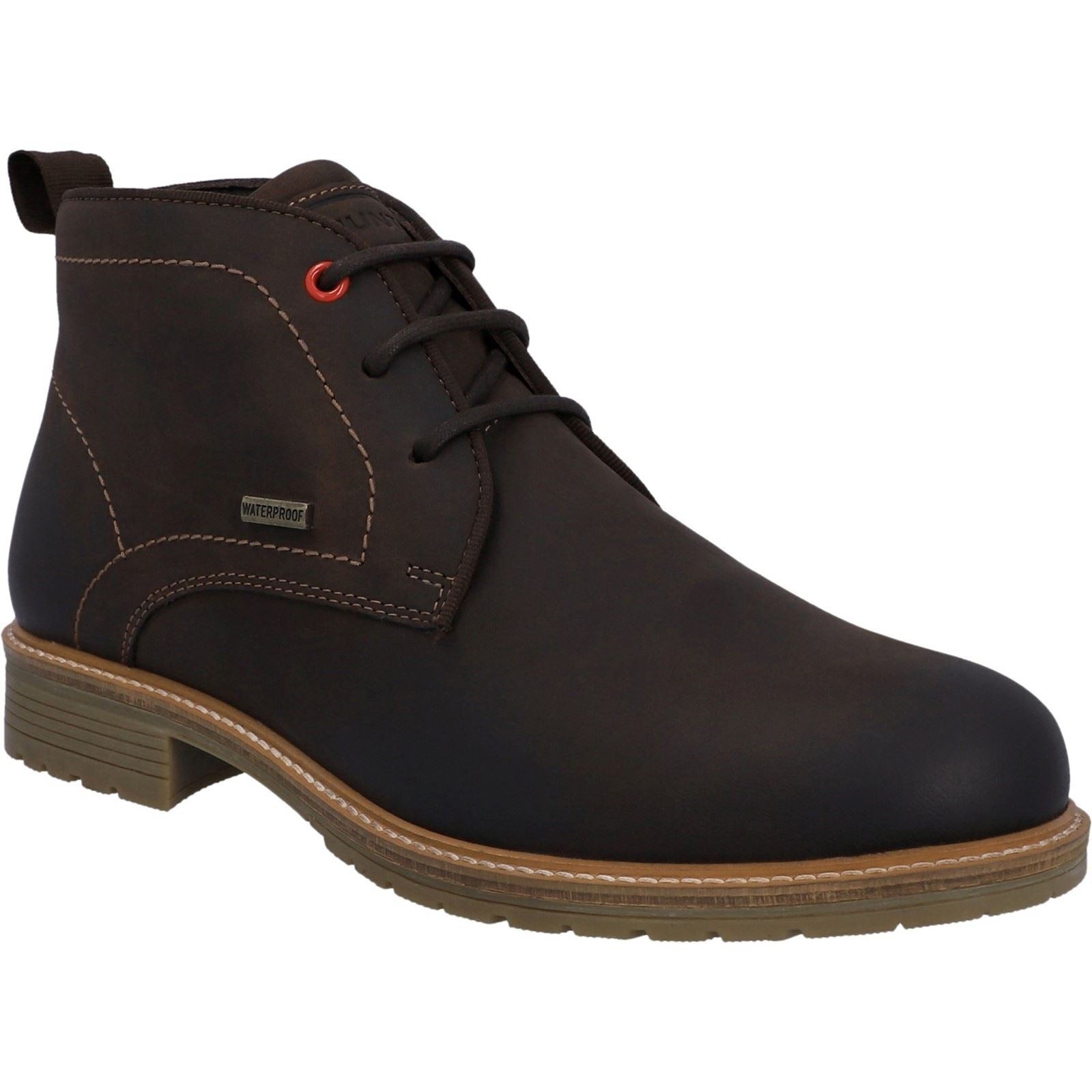 Brown waterproof ankle boot by Hunter featuring a smooth leather upper, contrasting stitching, lace-up front, and a durable rubber sole.