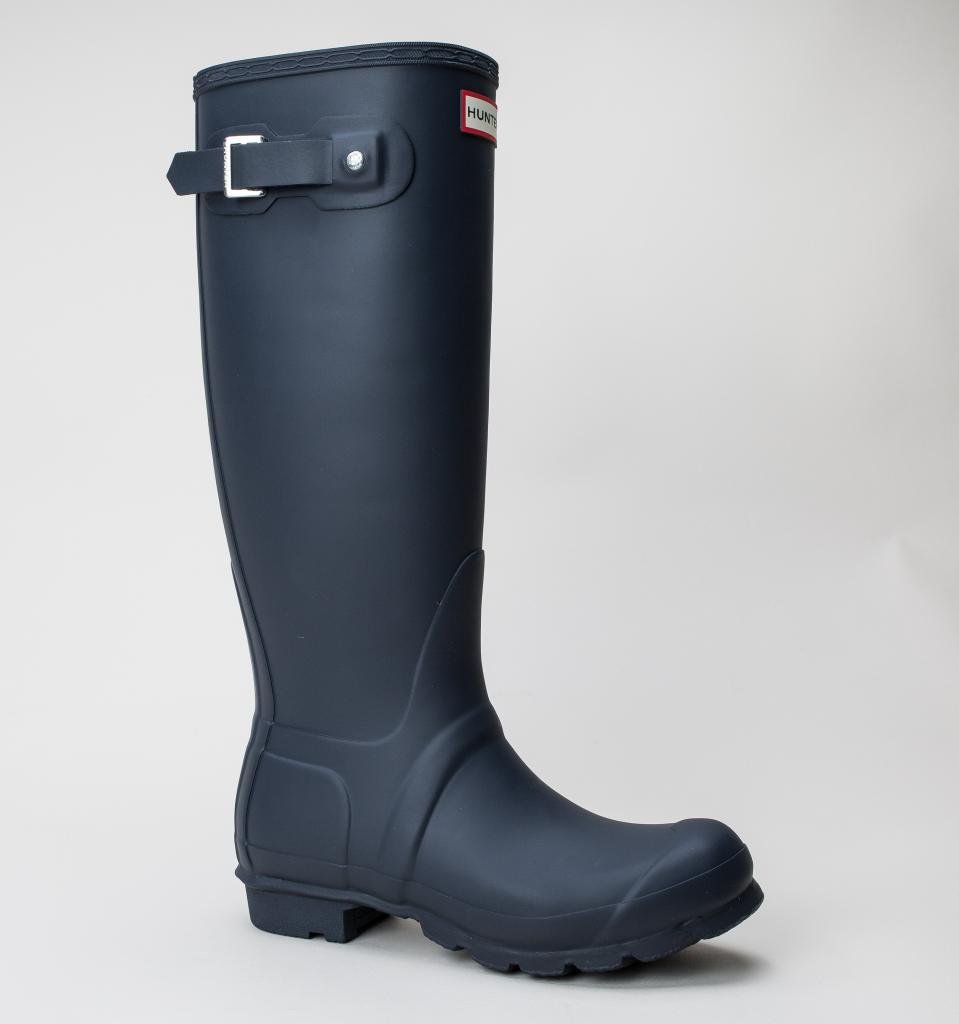 Navy blue rubber tall boot with a rounded toe, adjustable buckle strap, and textured sole, featuring the Hunter logo on the front.