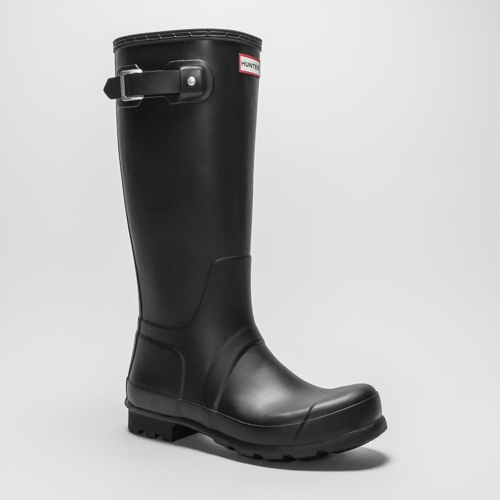 Black rubber knee-high wellies with a glossy finish, featuring a buckle detail on the side and a textured sole for grip, designed for durability and style.