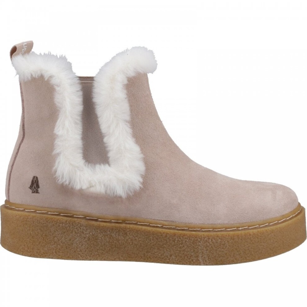 Nude suede Chelsea boots featuring a fluffy white faux fur trim, elastic side panels, and a thick, textured platform sole.