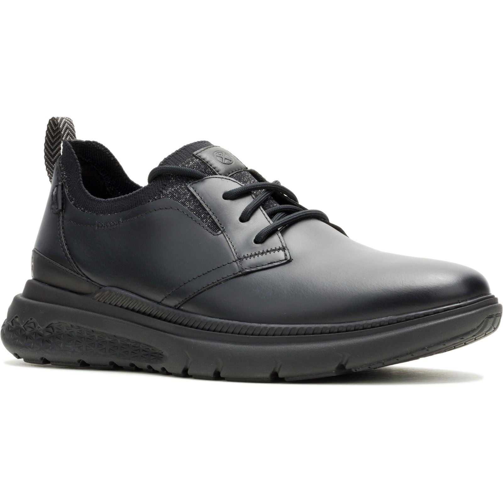 Black leather lace-up shoes featuring a sleek design, cushioned sole, and textured heel tab, ideal for casual or formal wear.