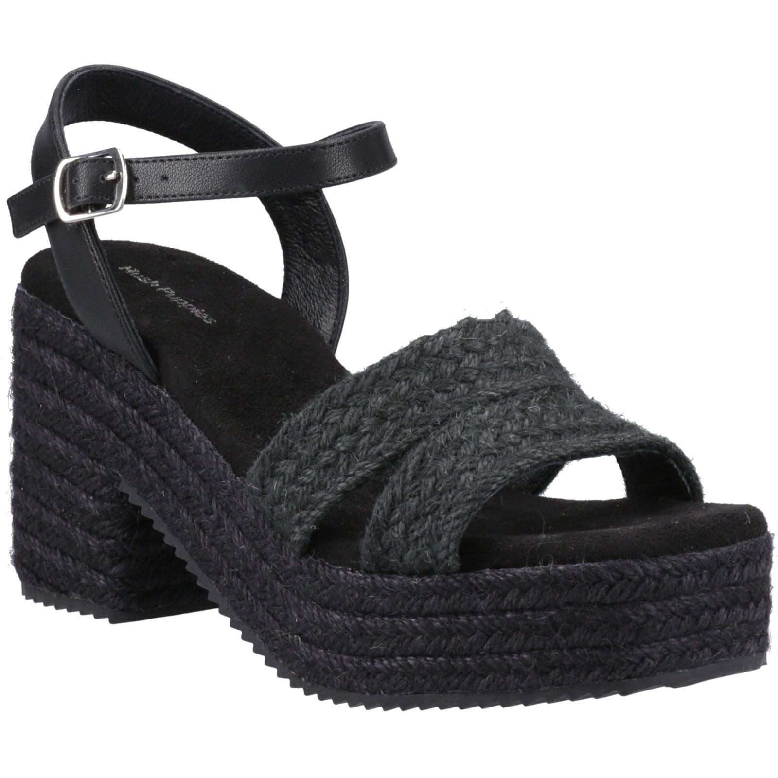 Black espadrille heel sandals featuring a woven textile upper, adjustable ankle strap, and a chunky braided platform sole.