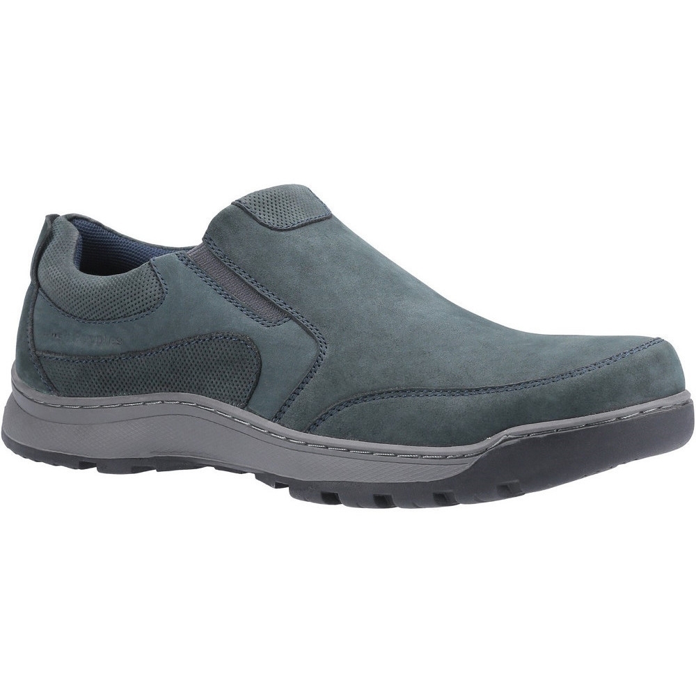 Navy leather slip-on trainers featuring padded memory foam, a textured side panel, and a durable rubber sole, designed for comfort and style, in size 9 (UK).