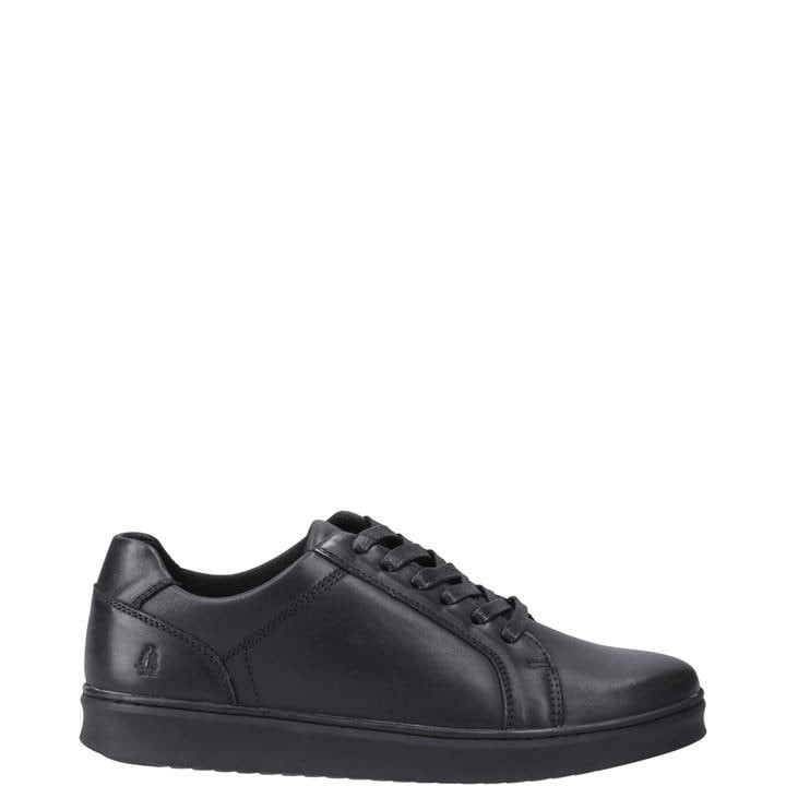 Black leather Hush Puppies Madden shoes for men, featuring a sleek design, lace-up closure, and a comfortable sole, available in size 6.
