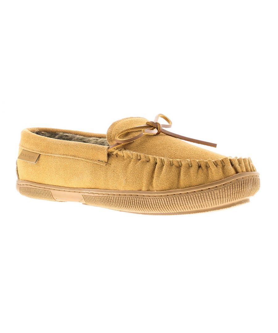 Tan suede classic slippers with a fringed design, bow detail, and a rubber sole, labeled as Hush Puppies Men 'Ace' in size 11.