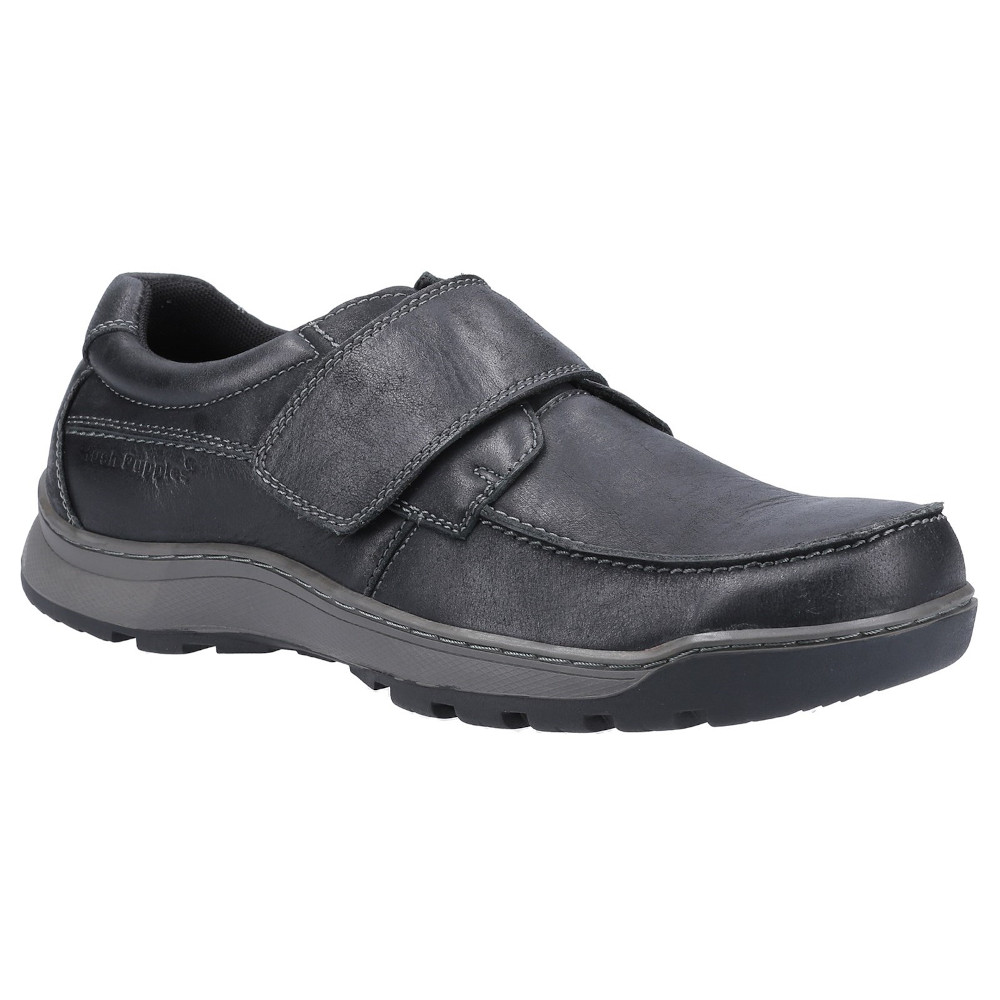 Black leather touch fastening shoes with a sturdy sole, featuring a wide strap and cushioned interior, designed for comfort and style, available in size 6.