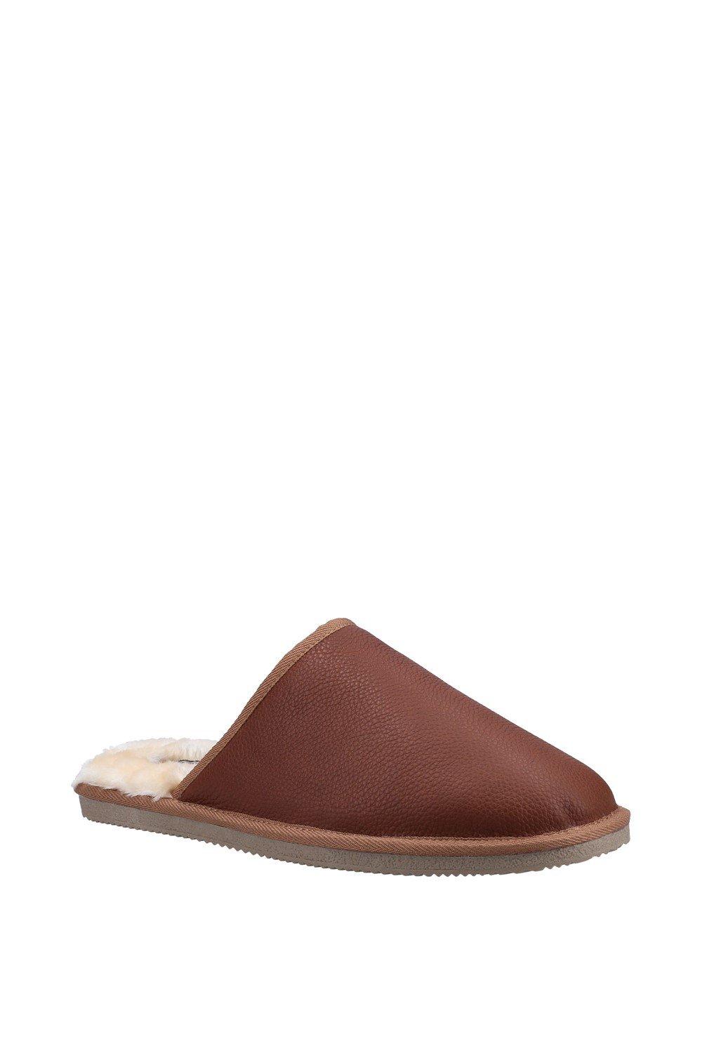 Tan leather slipper with a soft, plush lining and a flexible sole, designed for comfort, featuring a slip-on style, available in size 6.