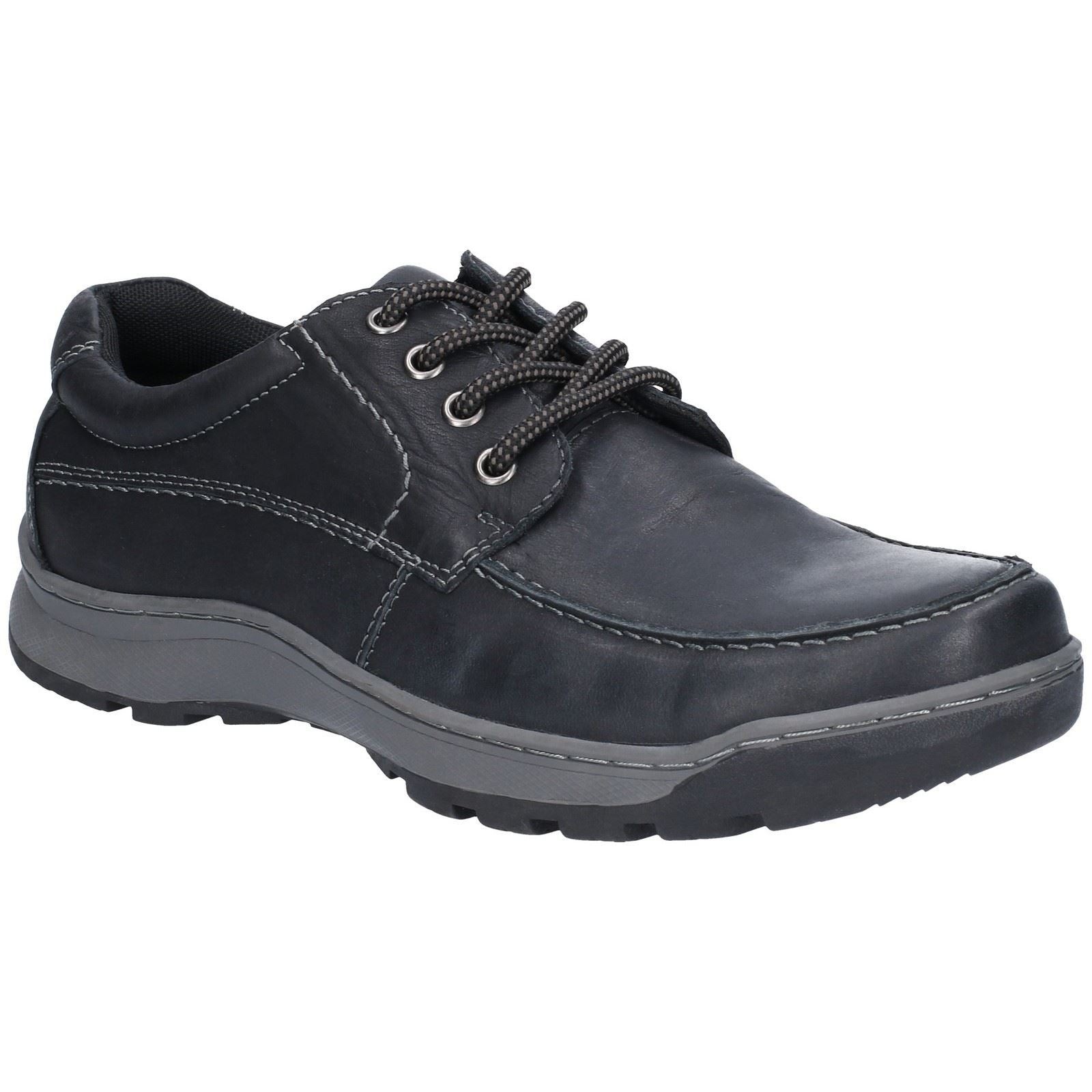 Black leather lace-up shoe with contrasting stitching, rubber sole, and cushioned collar, featuring a casual design suitable for everyday wear.