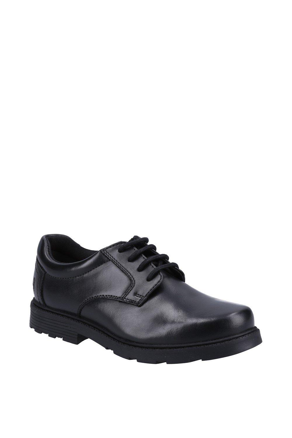 Black leather youth shoes with a smooth finish, lace-up design, and a sturdy rubber sole, featuring subtle stitching details for a classic look.