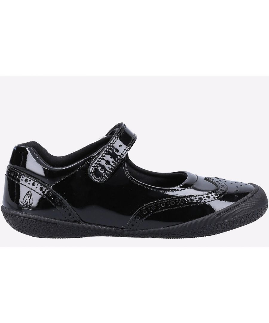 Black patent leather school shoe for children, featuring a Mary Jane strap, perforated detailing, and a flexible rubber sole, designed for comfort and style. Size UK 13 Kids.