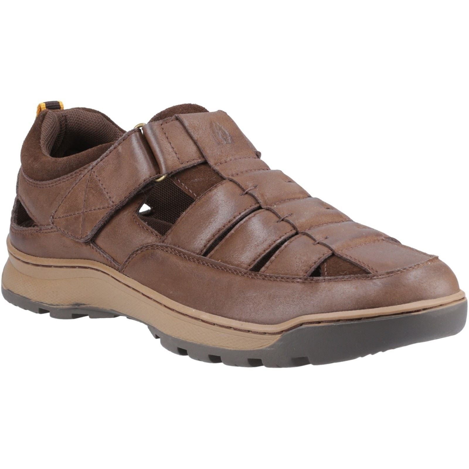 Brown leather fisherman sandals with crisscross straps, cushioned insole, and a durable rubber sole, featuring a secure fit and casual style, size 6 by Hush Puppies.