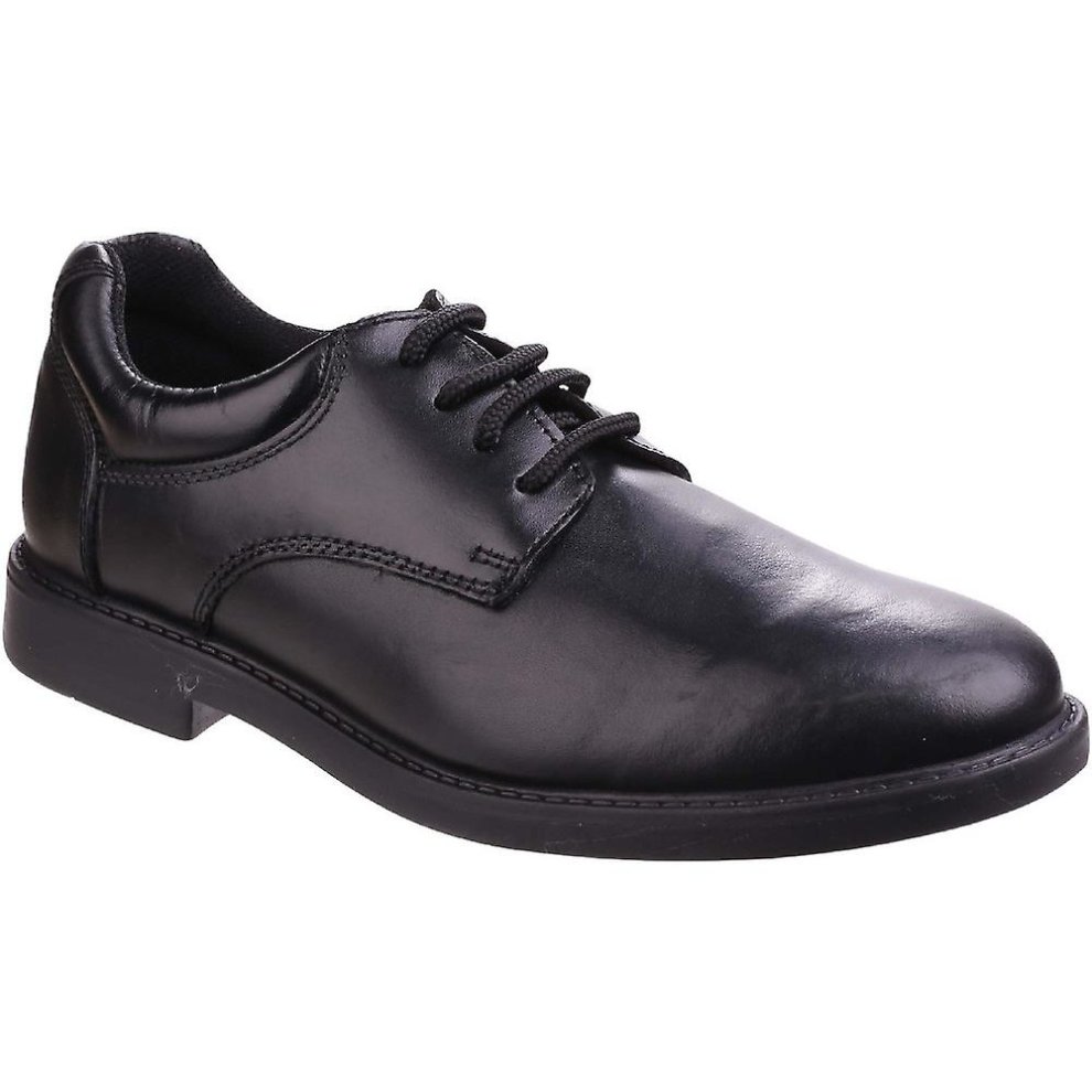 Black leather dress shoes for boys featuring a smooth finish, lace-up design, and a sturdy rubber sole, ideal for formal occasions.