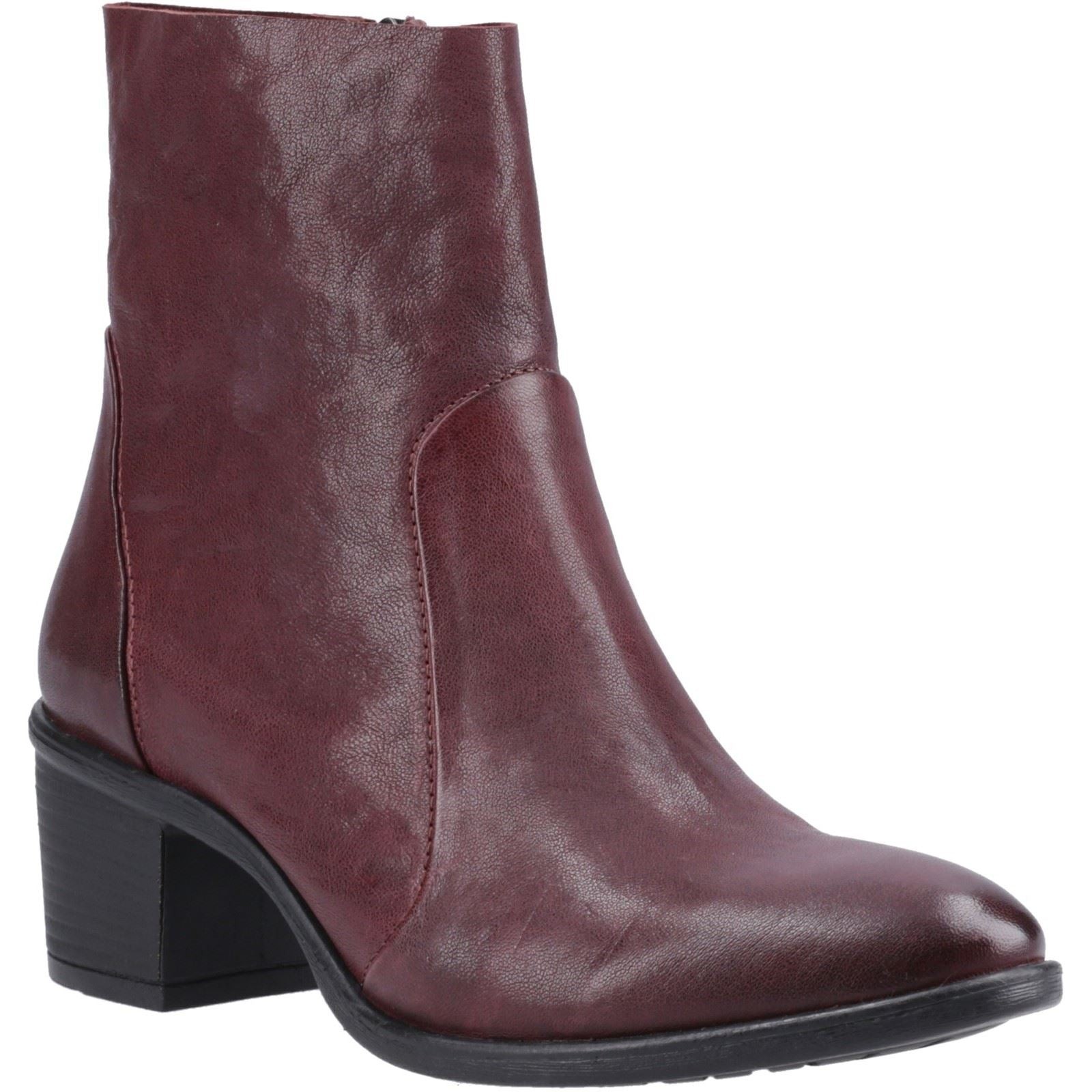 Plum leather ankle boots featuring a sleek design, a side zipper, and a modest block heel for added comfort and style.