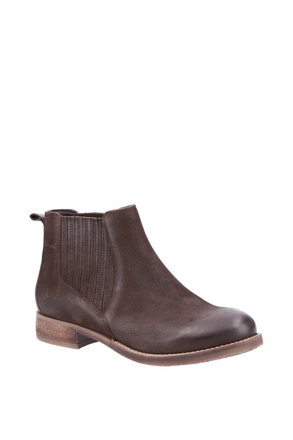 Brown leather ankle boots featuring elastic side panels, a rounded toe, and a low stacked heel for a stylish and comfortable look.