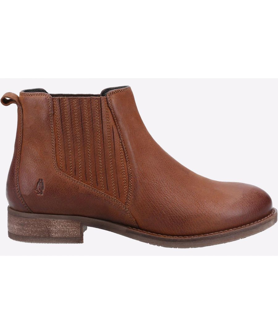 Tan leather ankle boots featuring elastic side panels, a rounded toe, and a low stacked heel, with a subtle logo embossed on the back.
