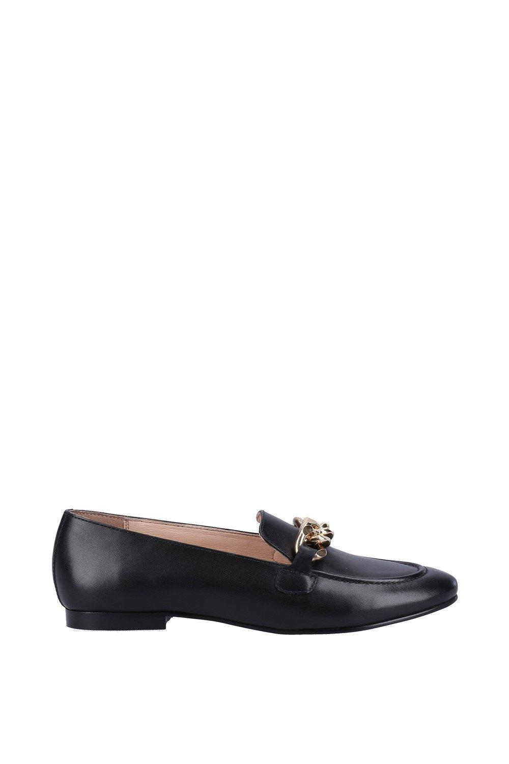Black leather Hush Puppies 'Harper' chain loafer featuring a gold chain detail on the front, a sleek silhouette, and a low heel for comfortable wear.