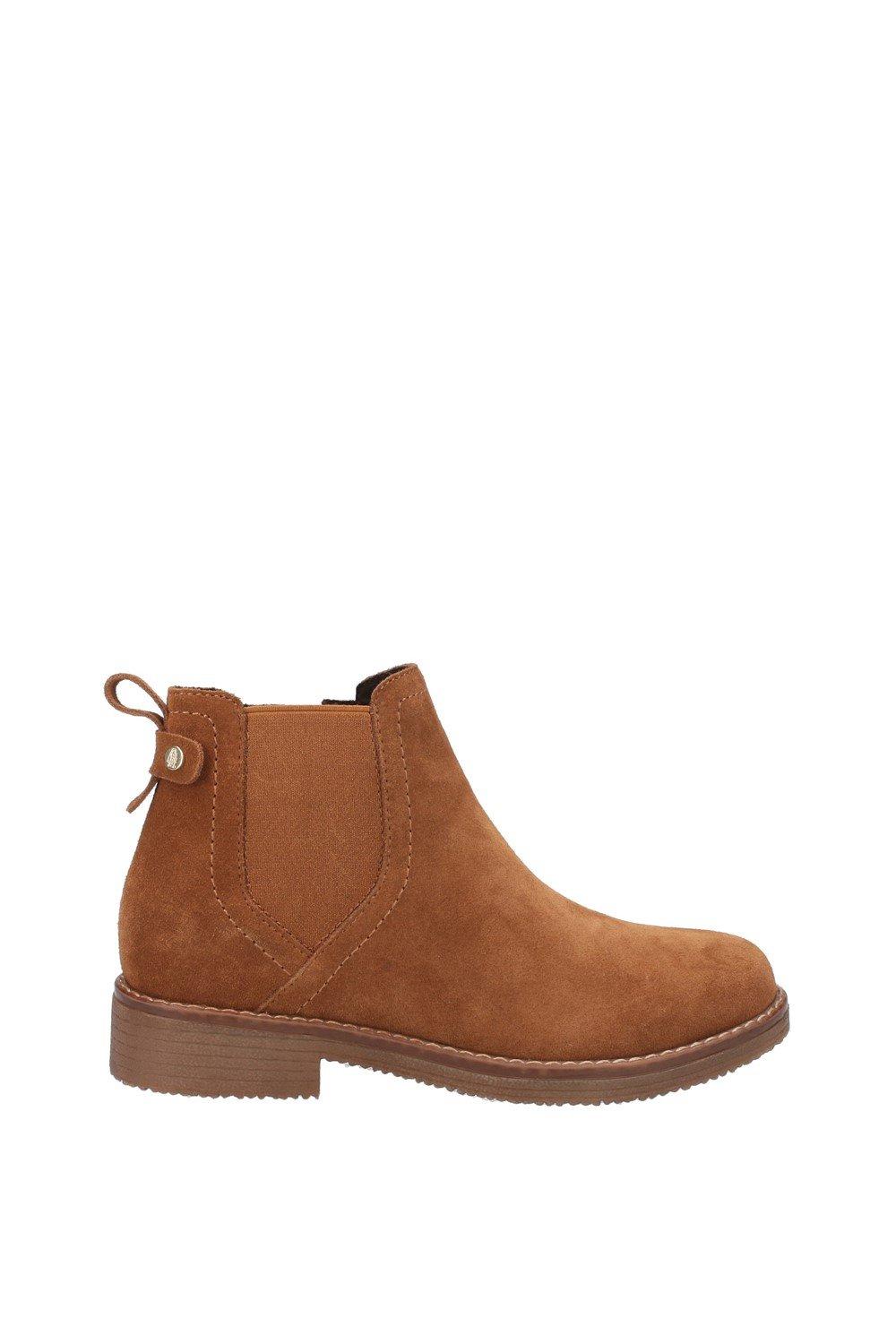 Tan suede ankle boots with a rounded toe, elastic side panels, and a decorative pull tab at the back, featuring a low stacked heel.