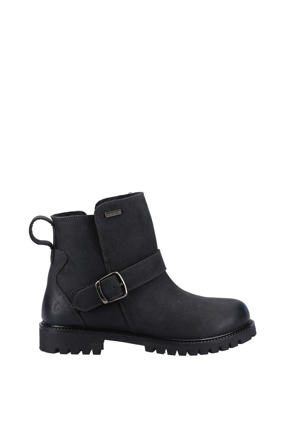 Black leather ankle boots featuring a side buckle strap, a rounded toe, and a rugged sole for traction, designed by Hush Puppies.