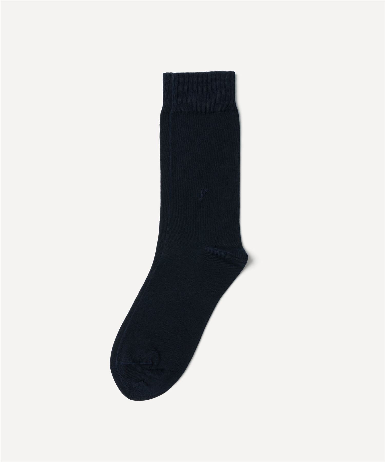 Dark blue cotton sock with a ribbed cuff and a smooth finish, featuring a subtle logo detail on the side.