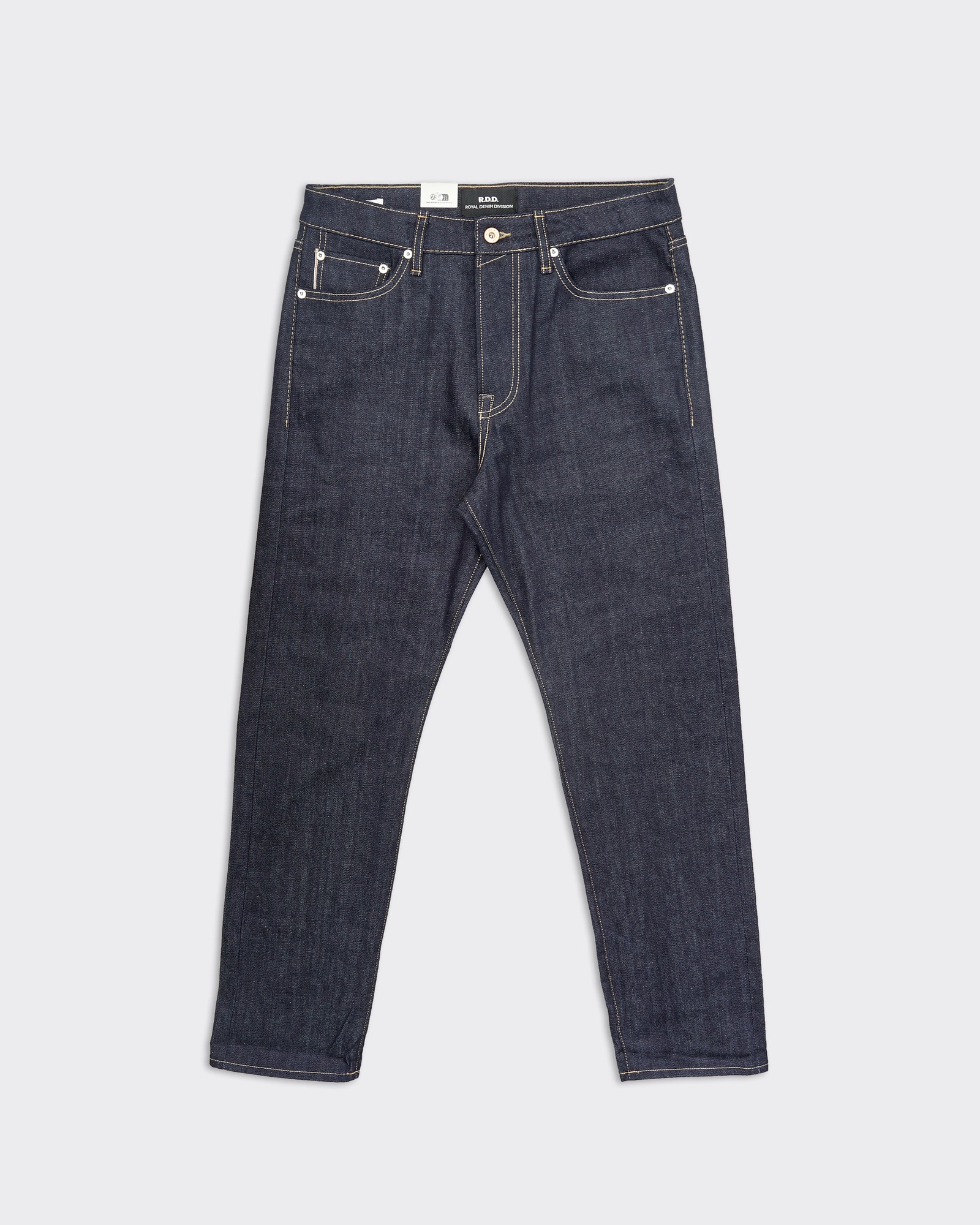Dark blue selvedge jeans by Jack & Jones, featuring a classic five-pocket design, straight fit, and subtle stitching details.