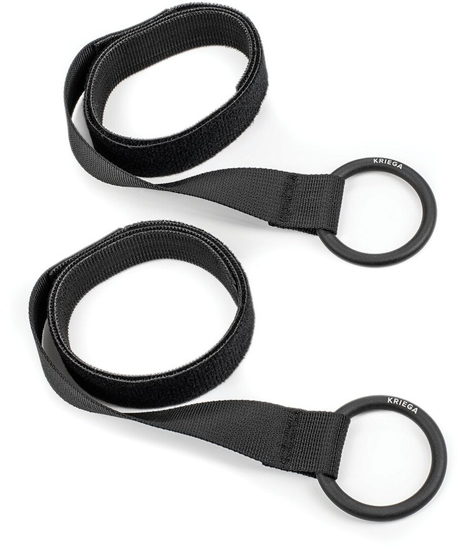 Two black nylon straps with circular metal mounting rings, featuring the "Kriega" logo, designed for securing items on dirt bikes.