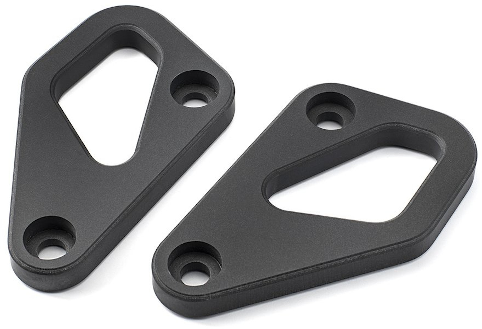 Black footpeg eliminators made of durable material, featuring an angled design with two mounting holes for Kriega compatibility with KTM 790/890 and Norden 901 models.