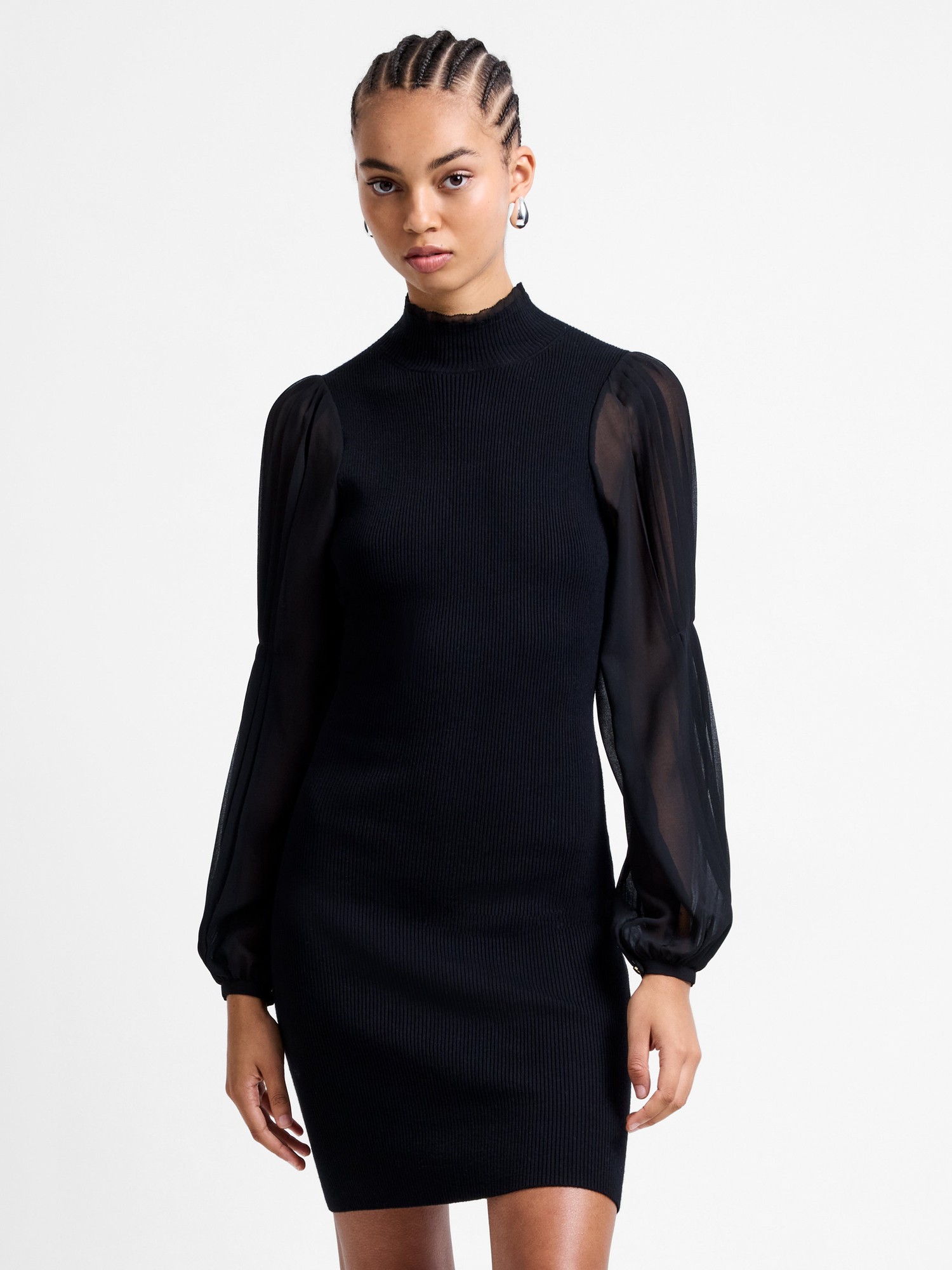 Black knitted mini dress with a high neck and long sheer puff sleeves, featuring a fitted silhouette and ribbed texture.