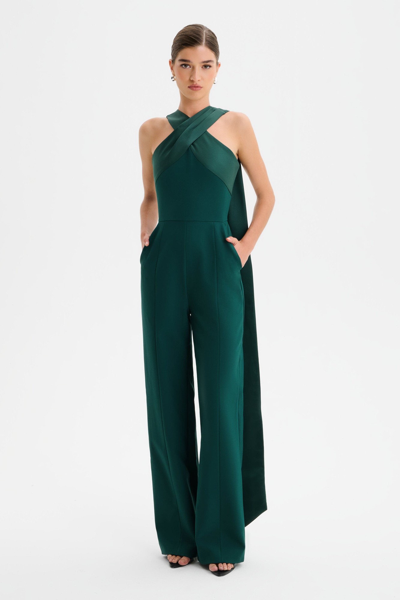 Emerald green satin drape jumpsuit featuring a cross neck design, straight leg silhouette, and pockets, designed by Lavish Alice in size XXL UK18.