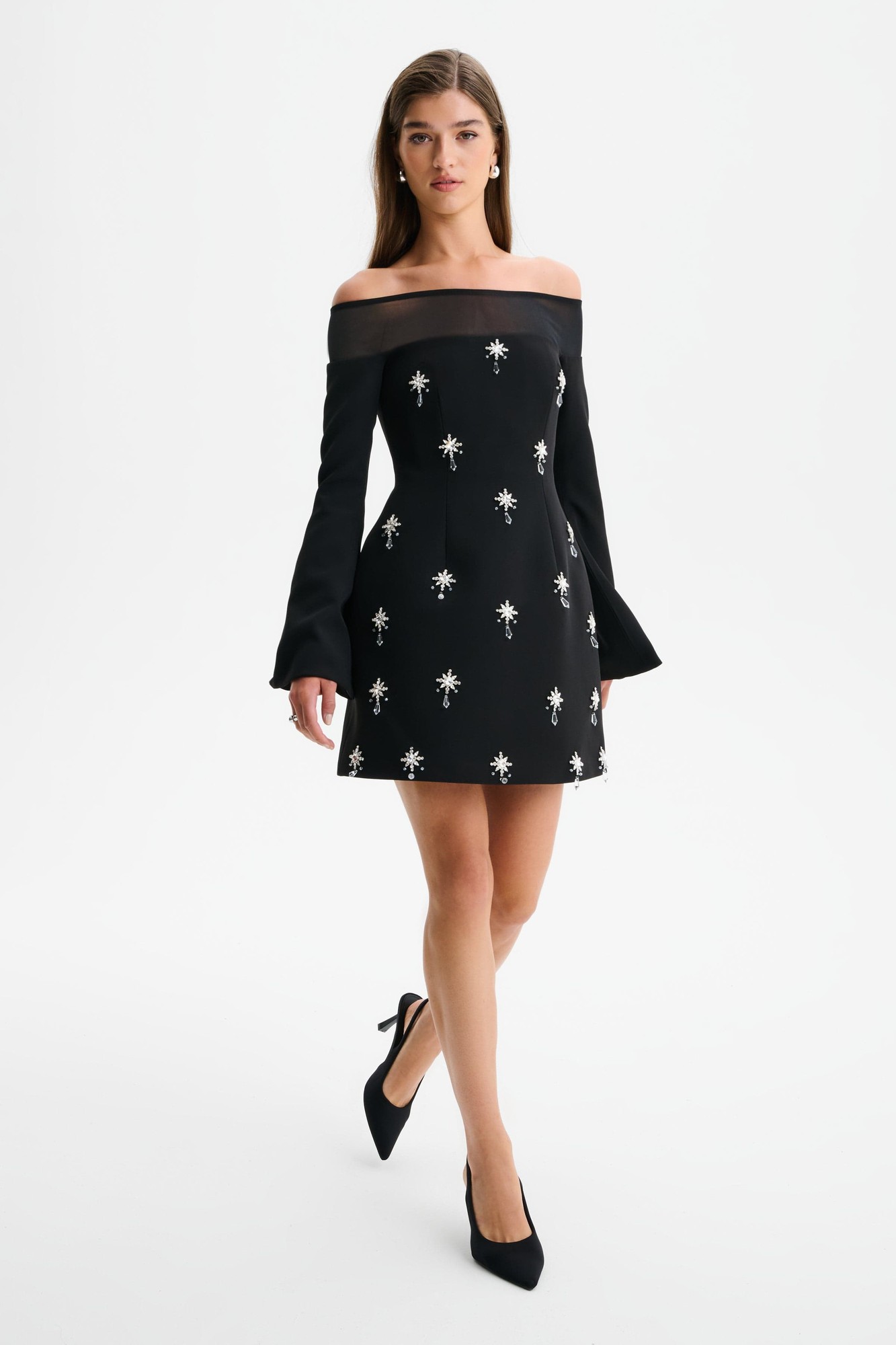 Off-shoulder black tulip dress with sheer detail, embellished with silver floral designs, long bell sleeves, and a fitted silhouette, available in XXL UK18.