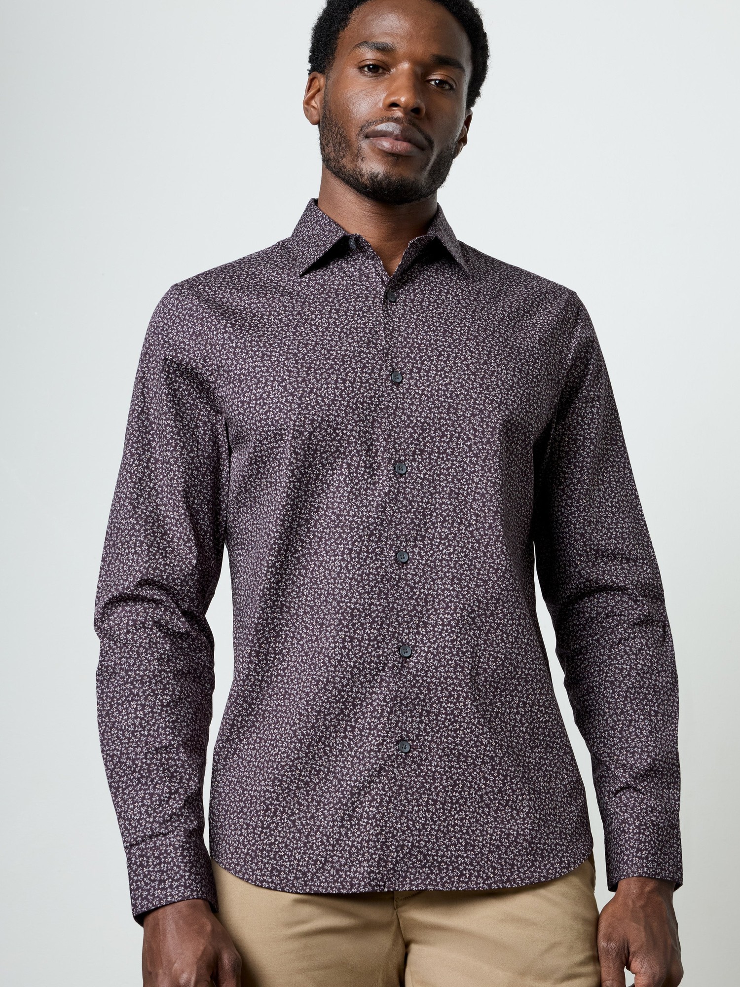 Long sleeve regular fit shirt in dark purple with a micro flower print, featuring a button-down collar and a sleek, smooth fabric.