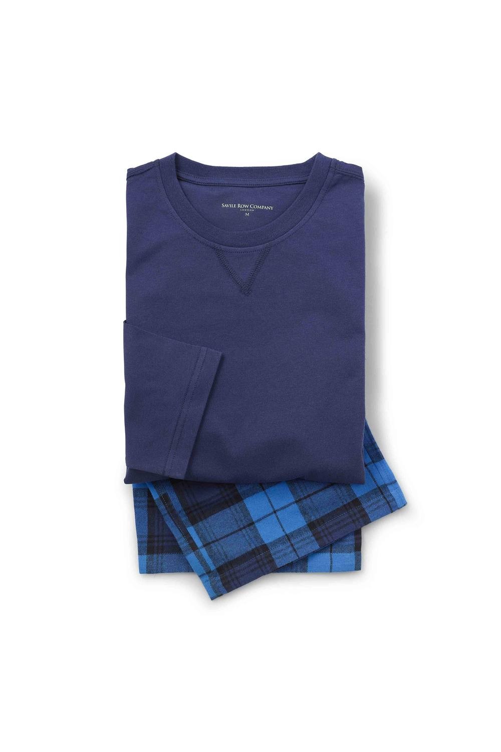 Blue cotton t-shirt with short sleeves and a v-neck, paired with checked pyjama bottoms in blue and black, neatly folded together.