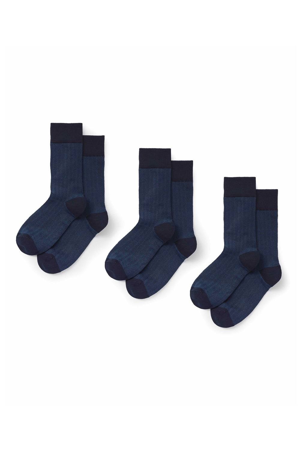 Three pairs of blue herringbone combed cotton blend socks, featuring contrasting dark blue cuffs and toes, suitable for men's shoe sizes 9-11.