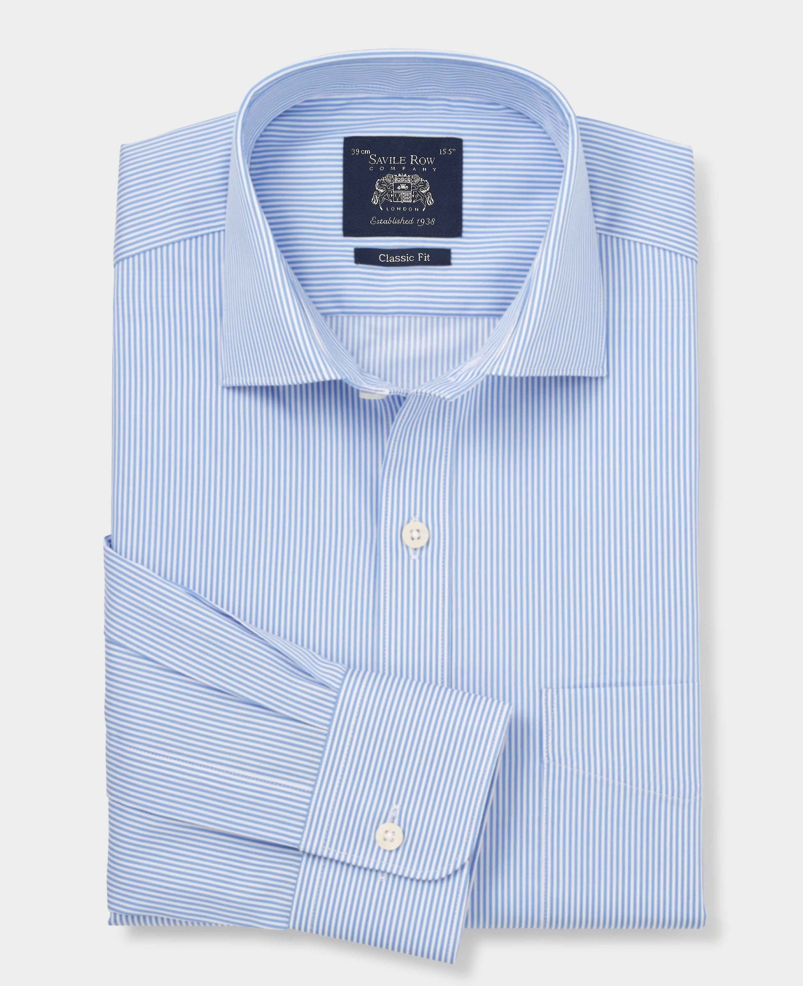 Men's blue cotton twill formal shirt featuring classic fit, single cuff, and light blue stripes, labeled size 17.5 X Extra Long, with a Savile Row Company tag.