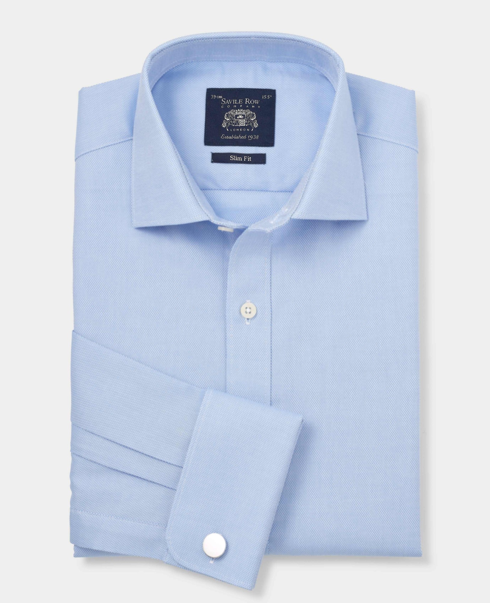 Light blue, textured cotton formal shirt with a slim fit and double cuffs, featuring a classic collar and a branded label inside the neck.