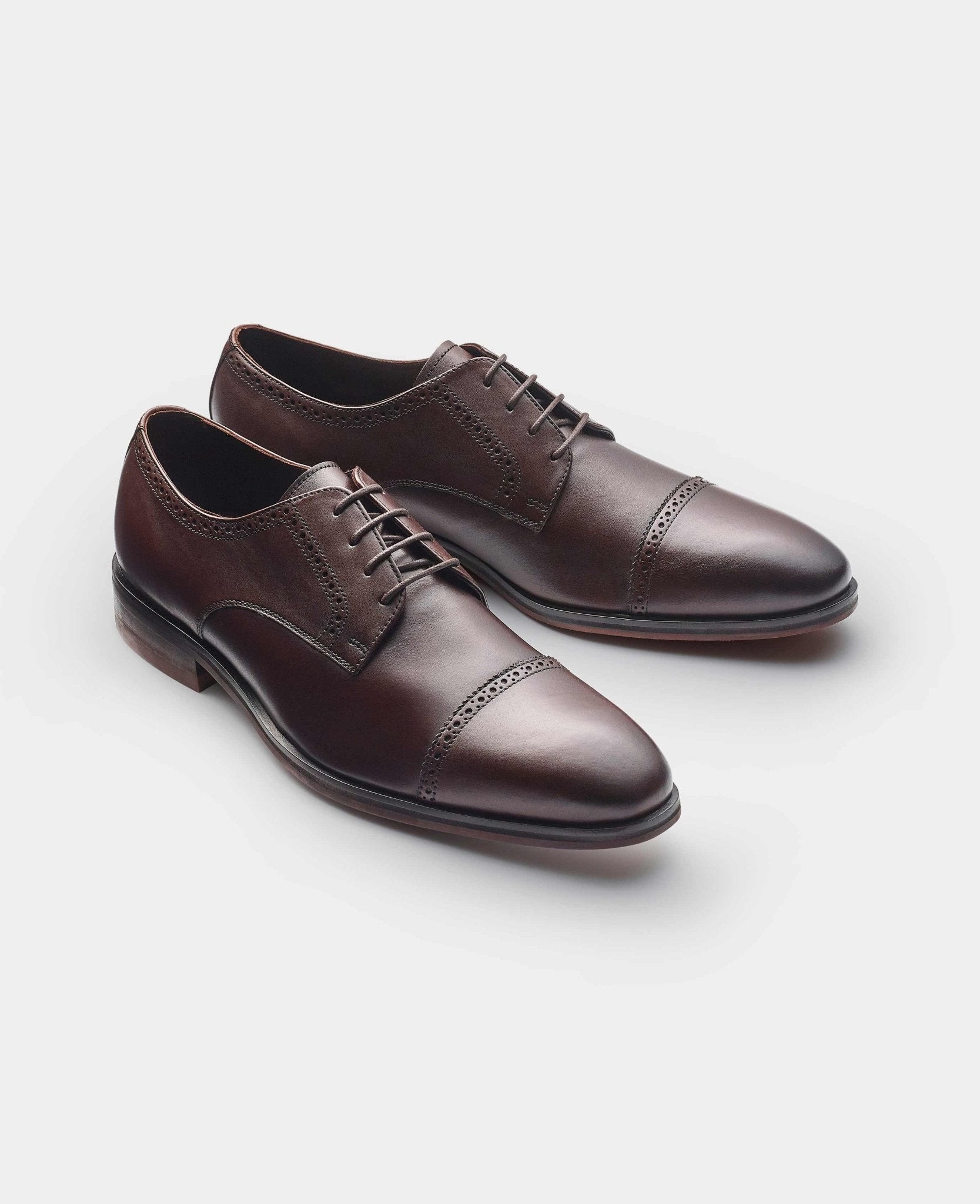 Men's brown leather capped derby shoes with a smooth finish, featuring decorative perforations and a lace-up design, size 11, by Savile Row Company.