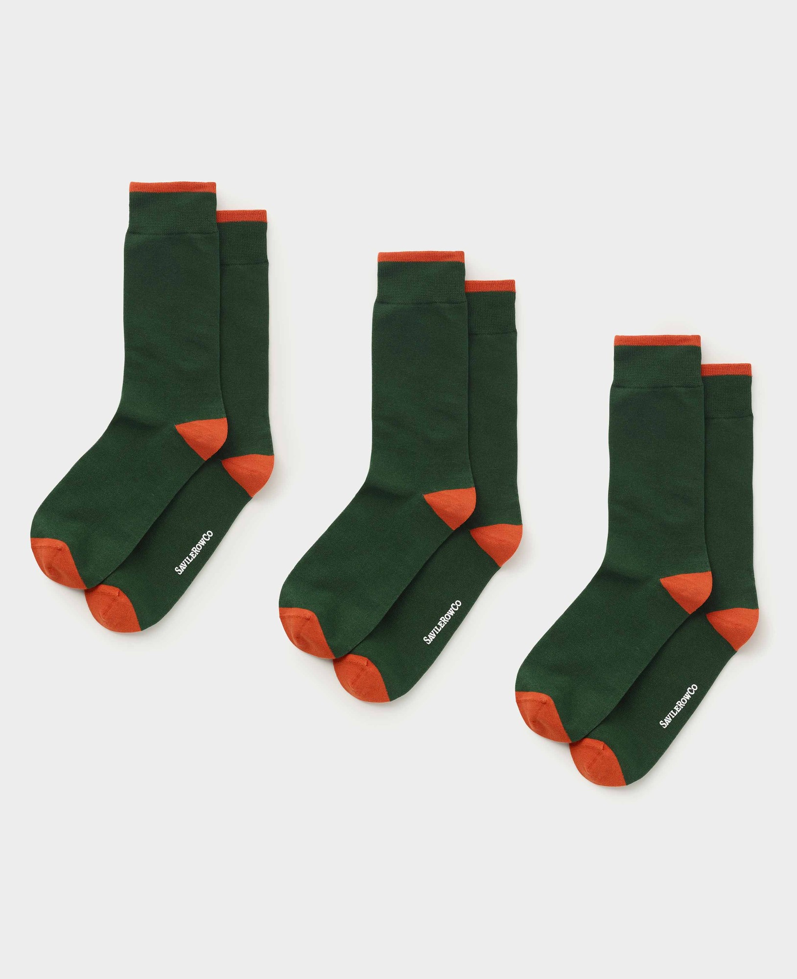 Three pairs of men's khaki cotton blend socks featuring a dark green body and contrasting orange cuffs, designed for sizes 9-12, by Savile Row Company.