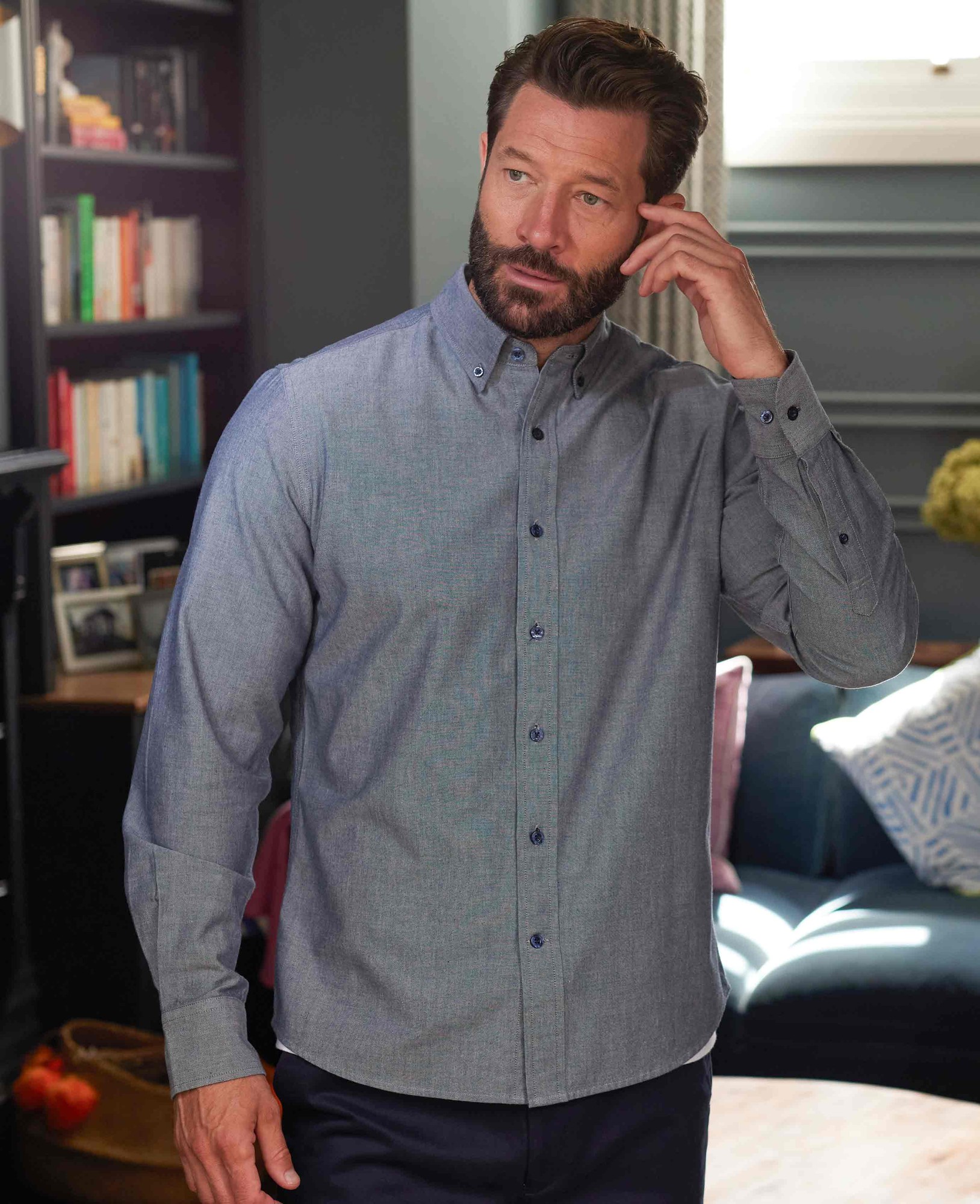 Men's navy slim fit chambray Oxford shirt in medium extra long size, featuring a button-down collar and long sleeves, styled with a relaxed fit.