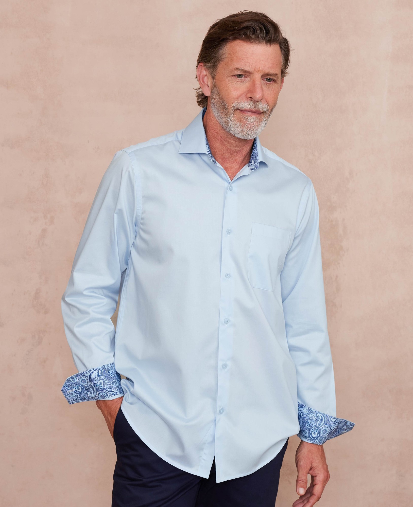 Pale blue cotton twill shirt with a classic fit, single cuff, and paisley-patterned cuffs, featuring a chest pocket, available in XXL extra long size.