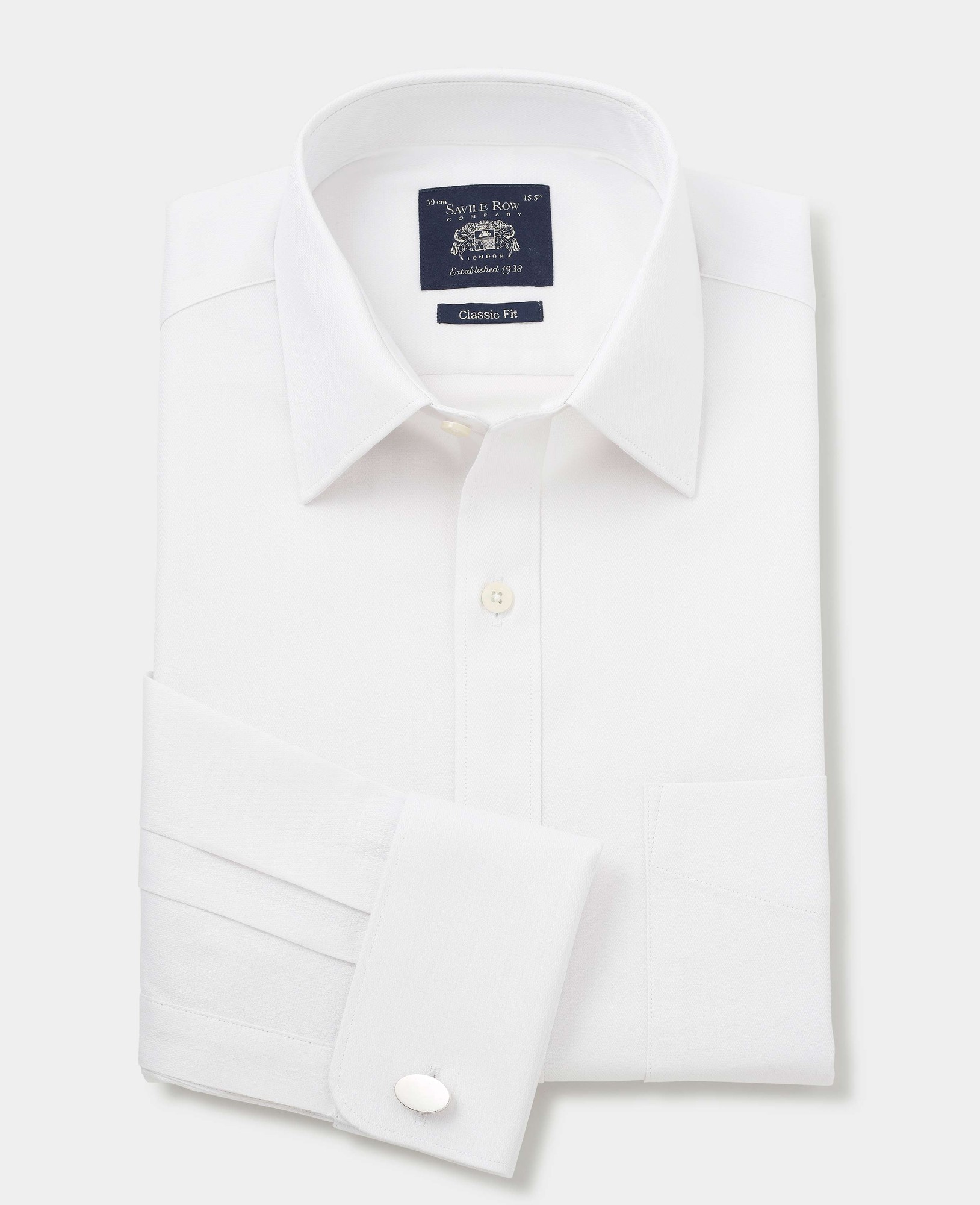 Classic fit white cotton herringbone formal shirt featuring double cuffs, a pointed collar, and a navy label from Savile Row Company.