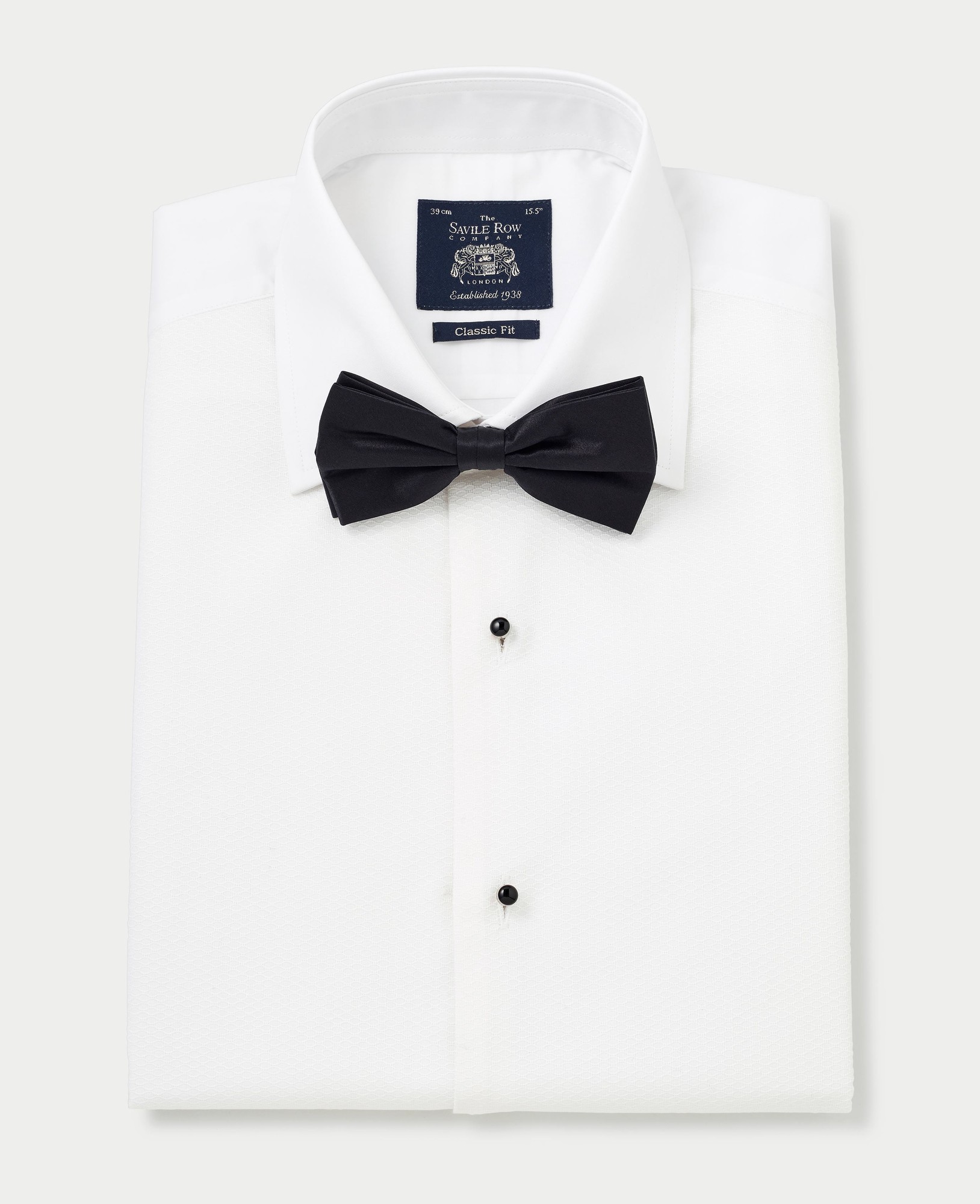 Men's white Marcella bib front dress shirt with double cuffs, featuring a textured fabric, black bow tie, and Savile Row Company label, size 16" X Extra Long - 36.5".