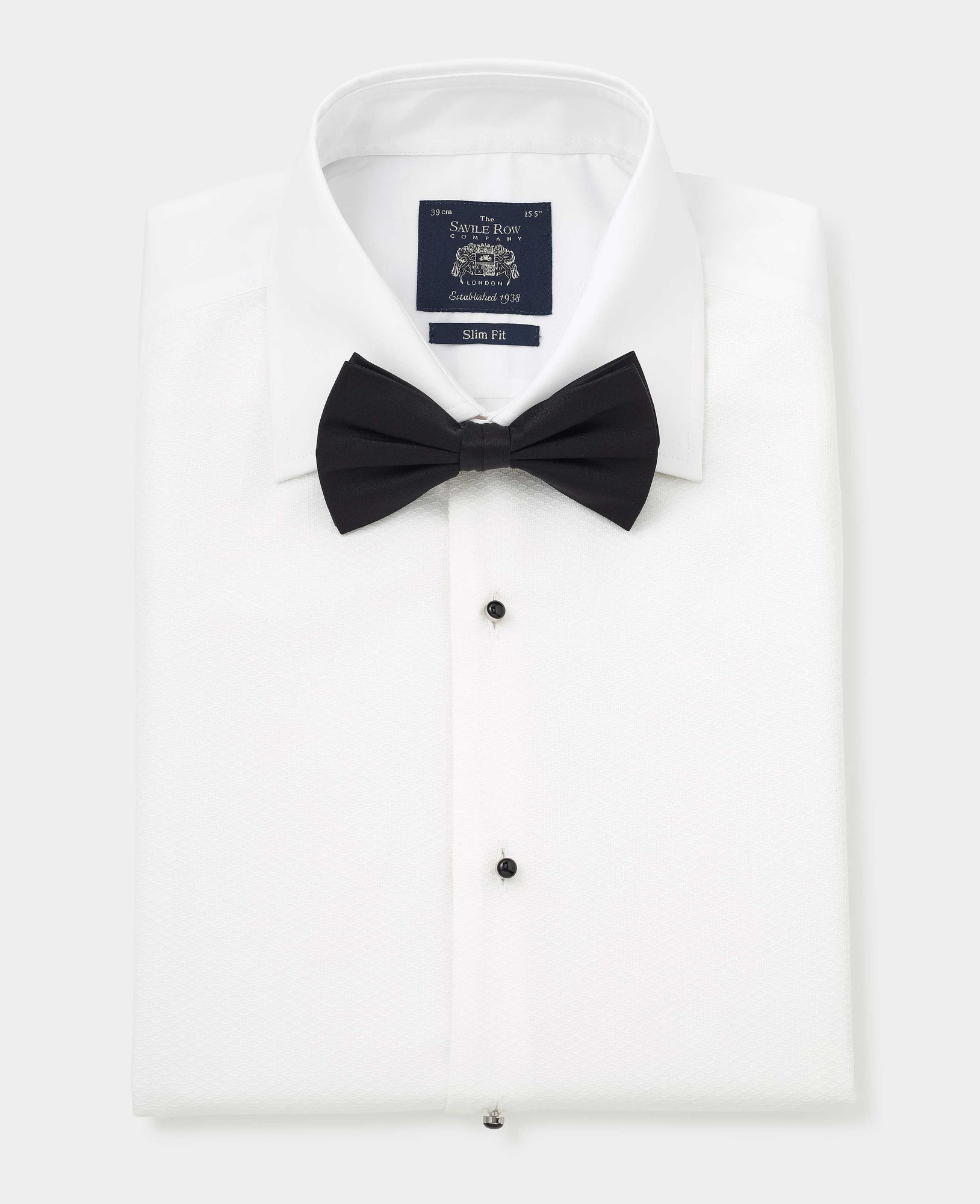 White Marcella bib front formal shirt with double cuffs, slim fit, size 16.5, featuring black buttons and a black bow tie, made by Savile Row Company.