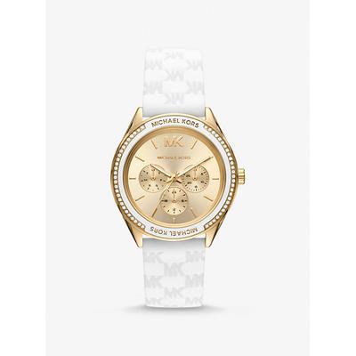 Michael Kors Jessa MK7267 women's watch features a 40mm gold dial with three sub-dials, surrounded by a sparkling bezel, and a white silicone strap embossed with the MK logo.