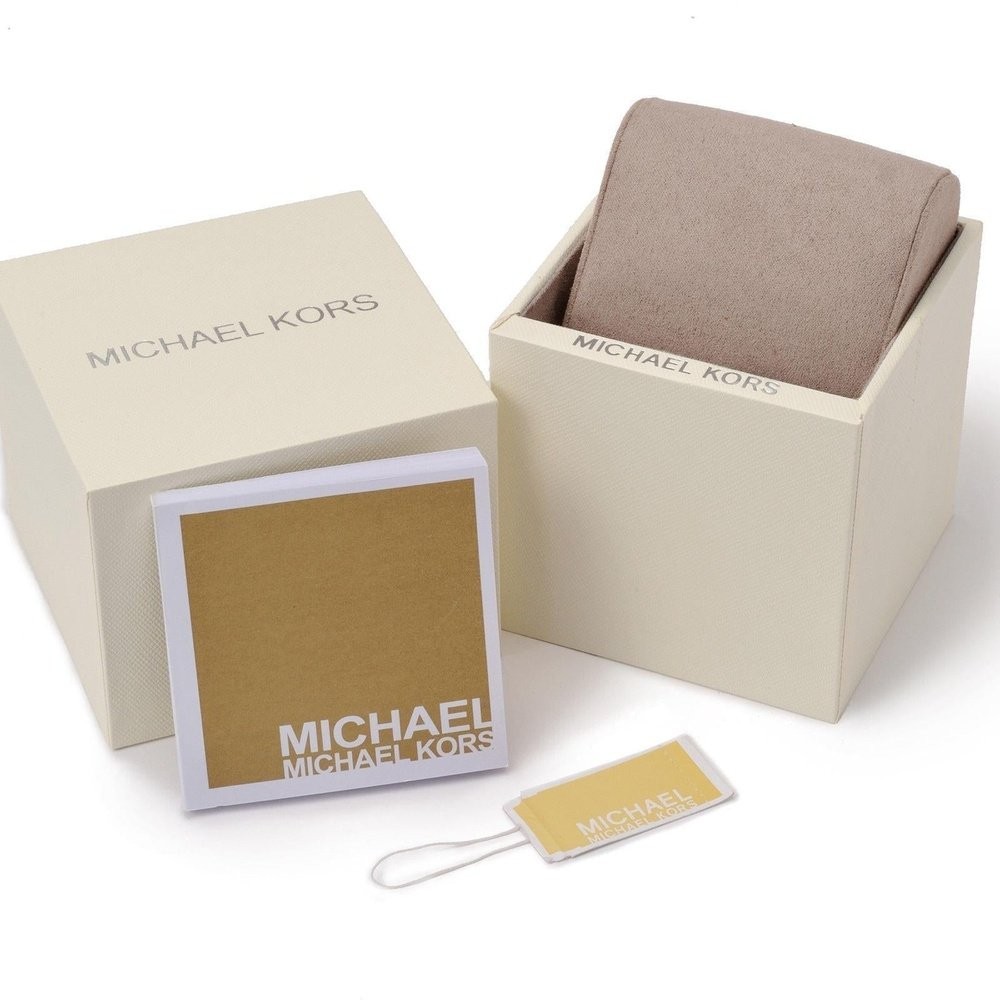 Michael Kors MK3149 Runway Twist Chronograph Ladies Watch features a gold-tone stainless steel case, a white dial with gold accents, and comes in a cream box with a soft cushion.