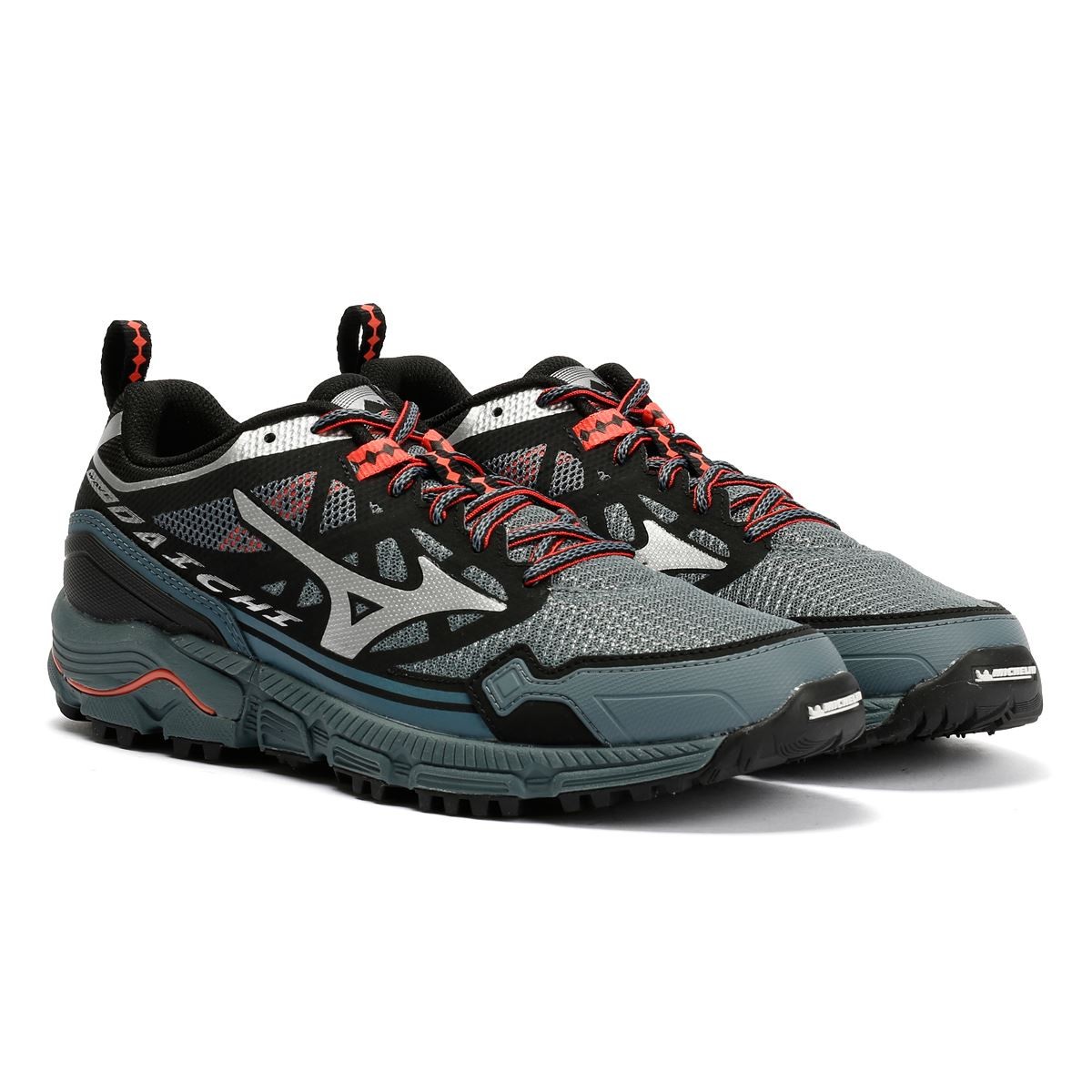 Mizuno Wave Daichi LS trainers in stormy weather gray and silver, featuring a mesh upper, black accents, red laces, and rugged soles for enhanced traction.