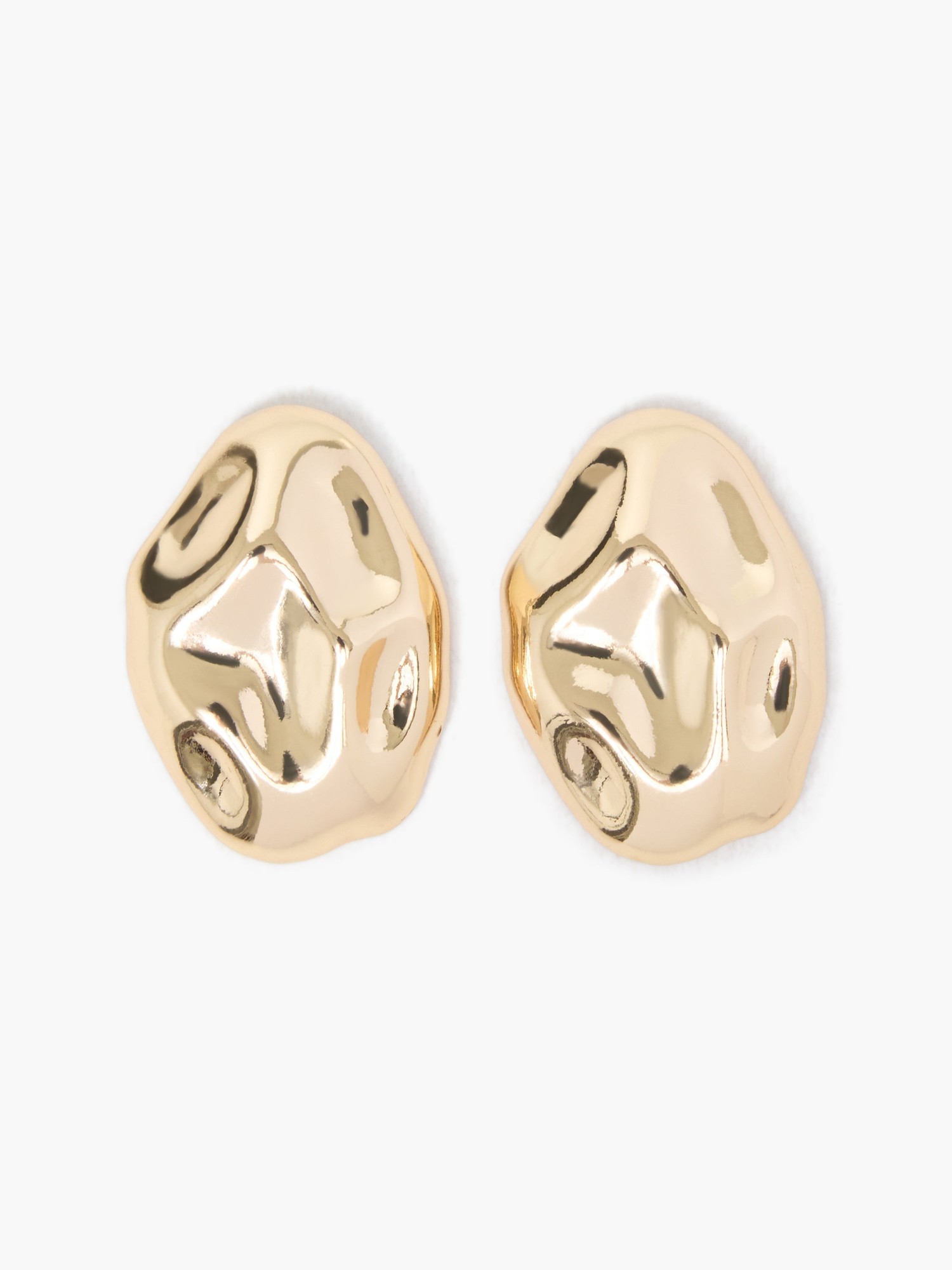 Gold-tone pebble-shaped stud earrings with a polished, irregular surface, showcasing a contemporary design by French Connection.