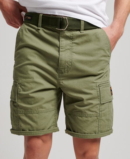 Olive green organic cotton cargo shorts with a belt, featuring multiple pockets and rolled cuffs, designed by Superdry.